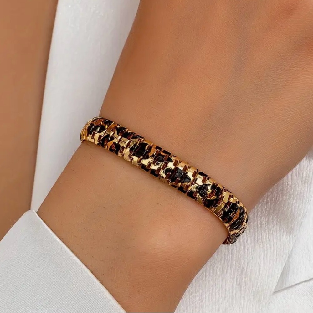 Elegant Gold and Black Bracelet